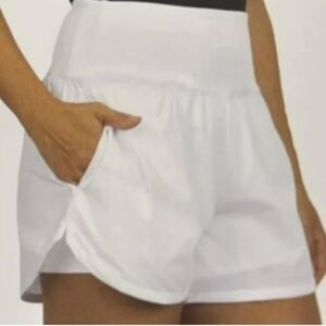 NWT Spyder Women's athletic shorts. Built in compression shorts !!! Size L